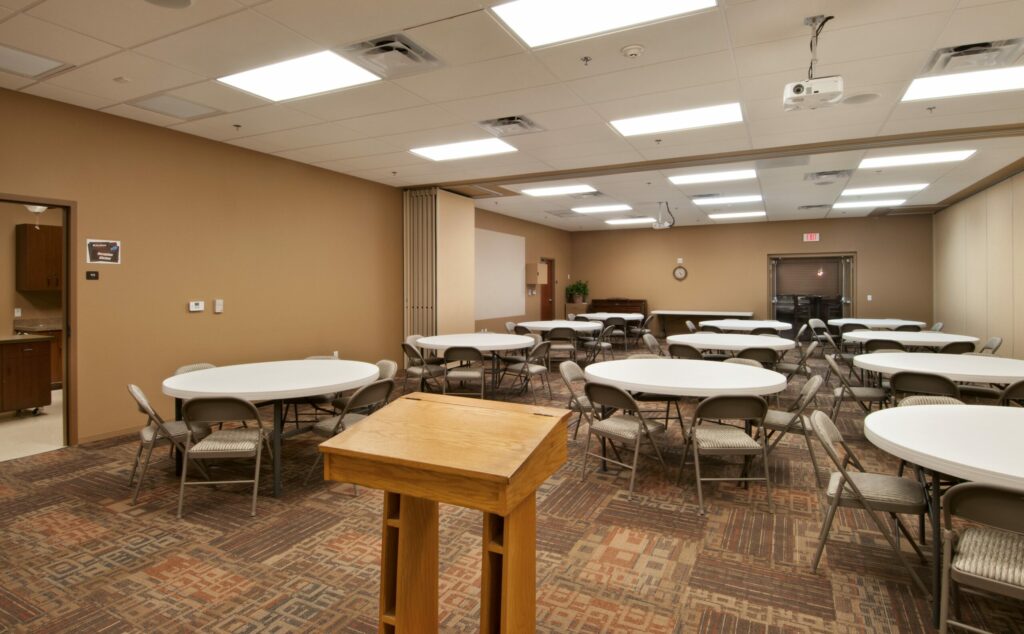 inside meeting room lots of tables and chairs