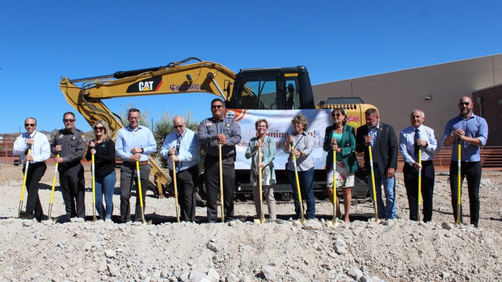 Mohave County representatives posing with shoves on site